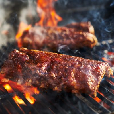 american bbq ribs cooking on grill