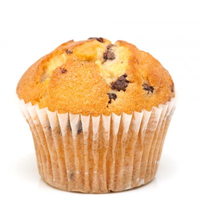 Fresh chocolate muffin close up.